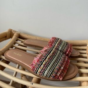 Flat slip on sandals. Colourful & fun. Never been worn. Size 7.5.